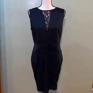Black lacy body con dress